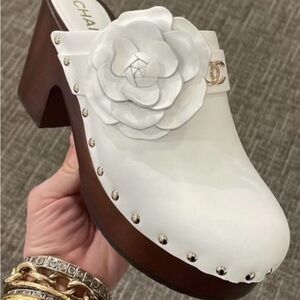 CHANEL White Leather Mules with Floral Accent
